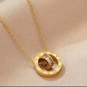 Roman numeral necklace.